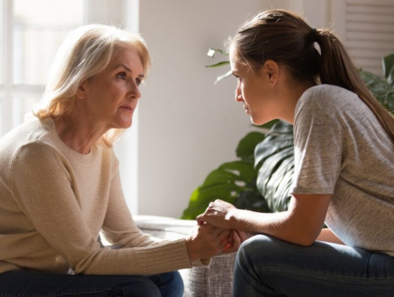 Two women having a tense conversation