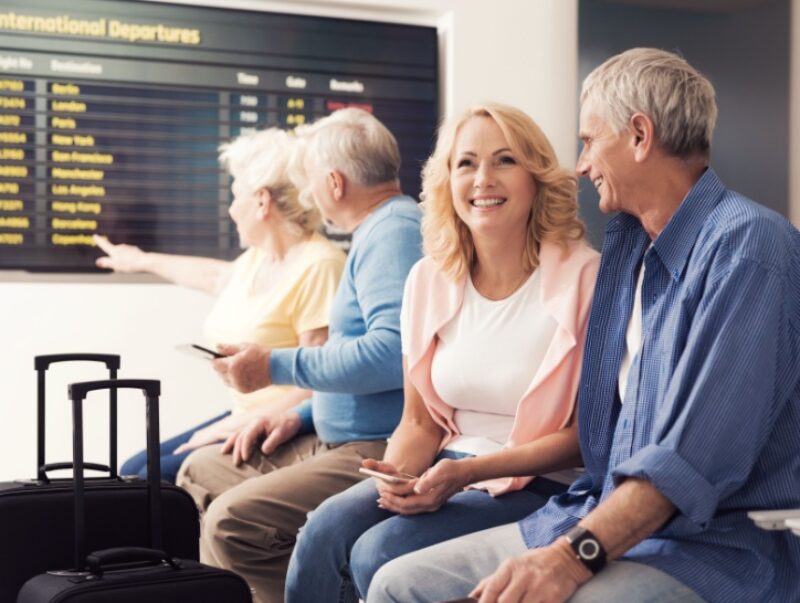 A couple waiting in the lounge at the airport