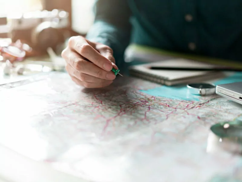A person looks at a map